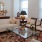 spacious, furnished living room with bright lighting