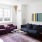 sunny living room with a work space