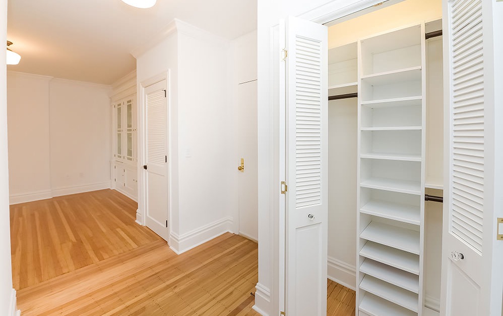 well lit foyer with closet