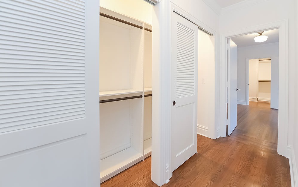 well lit closet in hall