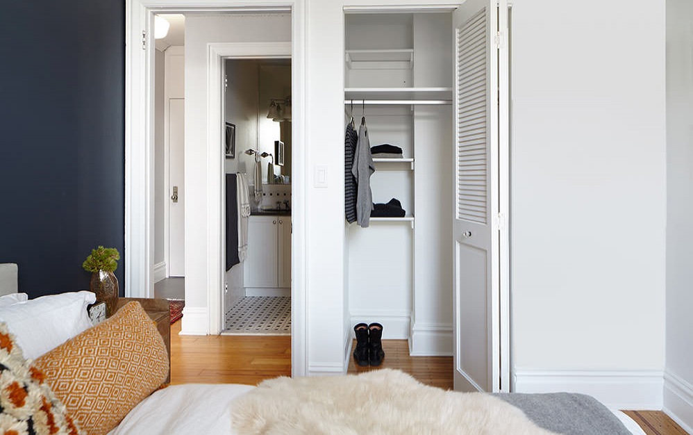bedroom closet with built-in shelving