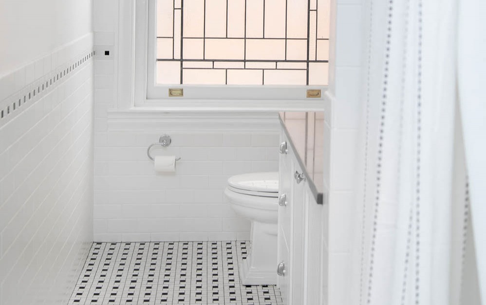 shower in bathroom with large window