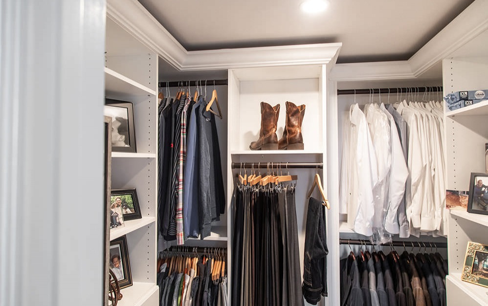 large walk-in closet with shelving and recessed lights