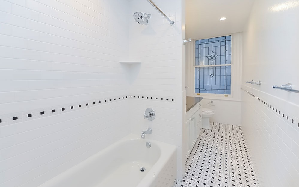 recessed lighting in bath with shower/tub combo