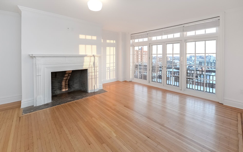 city views in living room with fireplace