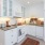 a kitchen with under cabinet lighting